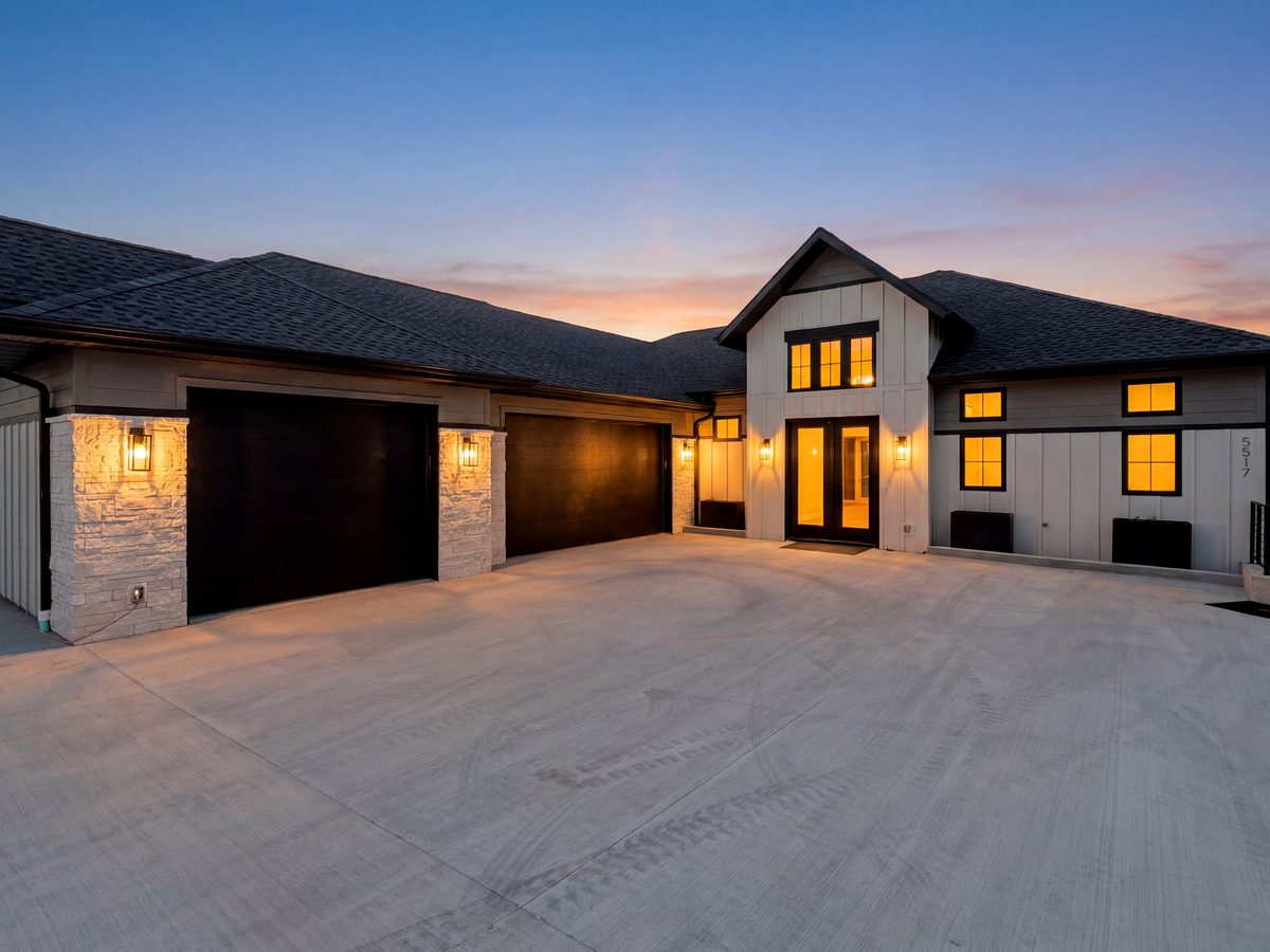 Harpers Cōv Residences — lakefront home at twilight, Osage Beach, MO